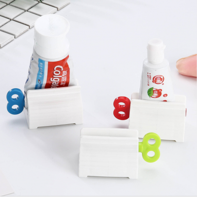 Promotion low price high quality Bathroom Plastic Cream Tube Squeezing Dispenser manual toothpaste dispenser for lifetime